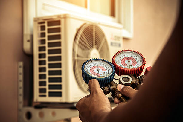 Professional Heat Pump Repair technician working in Farnham, NY